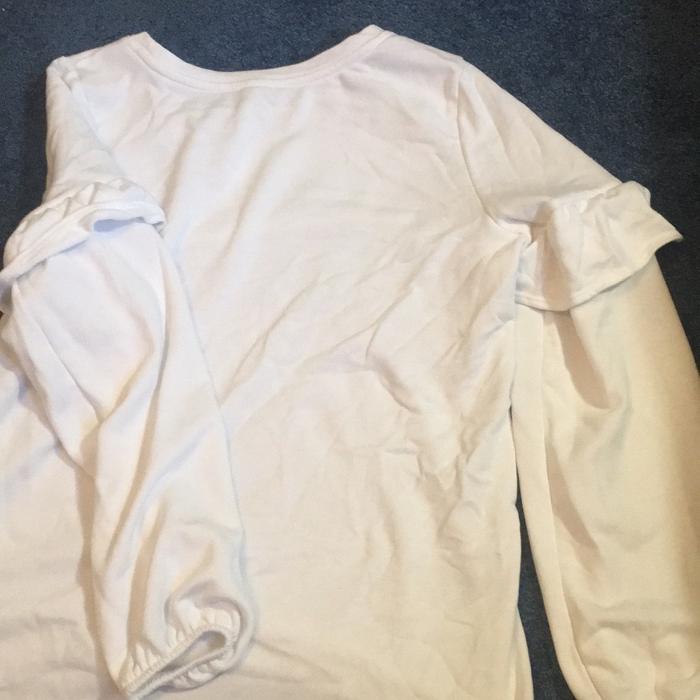plain white sweater with frilly the sleeve